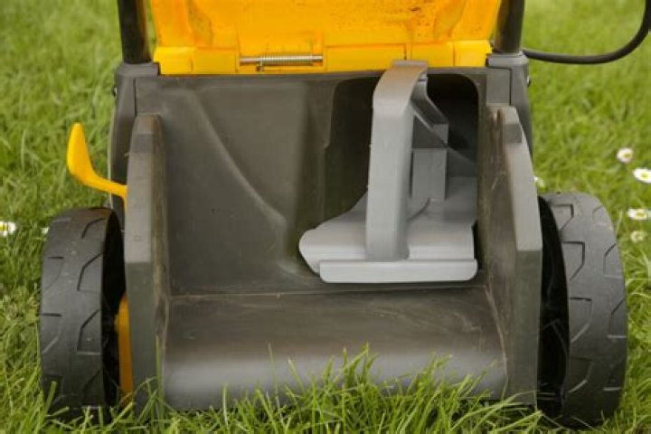 What is a mulching plug on a lawn mower?