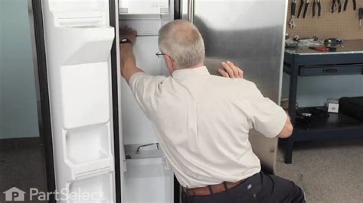 Where is the drain on a GE side by side refrigerator?