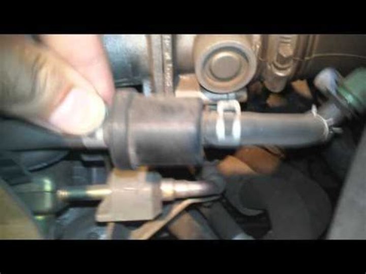 Where is the fuel filter located on a 2014 Nissan Sentra?