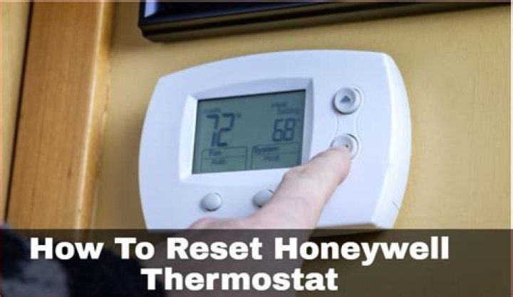 Where is the reset button on a thermostat?