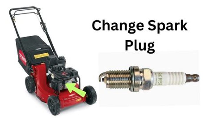 Where is the spark plug on a lawn mower?