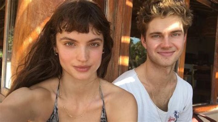 Who is Charlbi Dean husband Luke Volker?