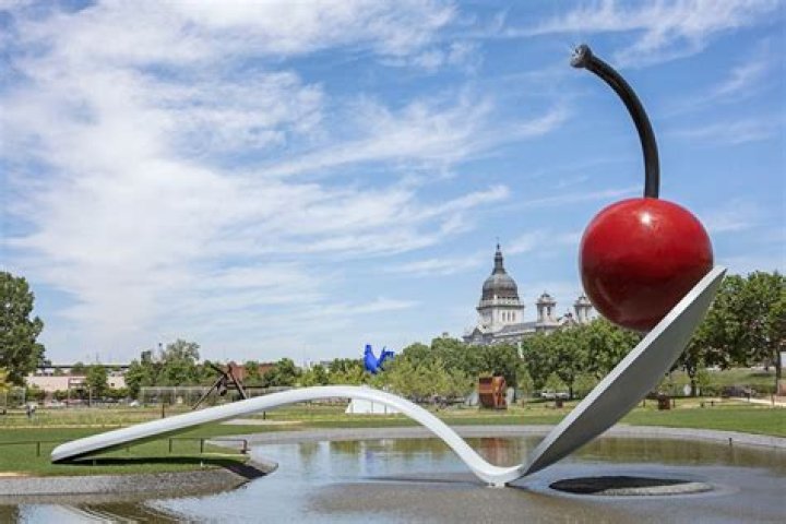 Who made the spoon and cherry sculpture?