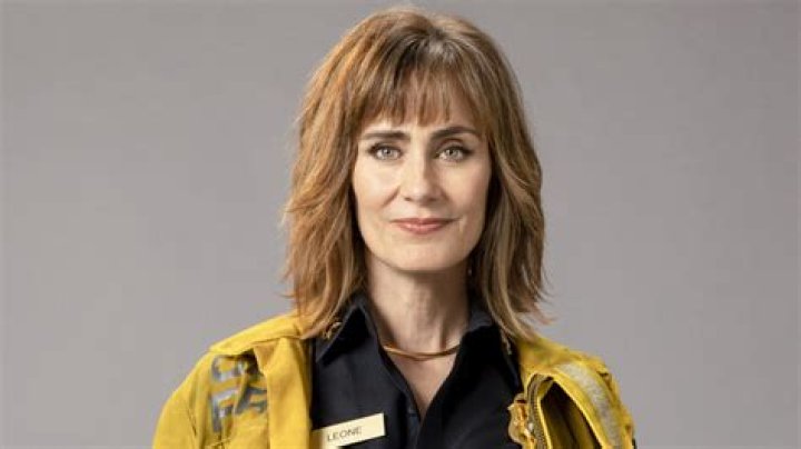 Who plays Sharon’s husband in Moneyball?