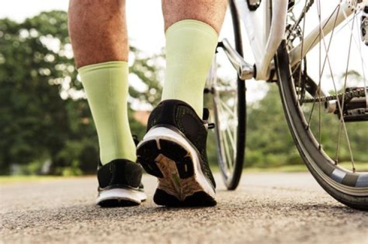 Why do cyclists wear long socks?