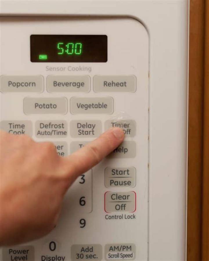 Why does my microwave turn on when I close the door?