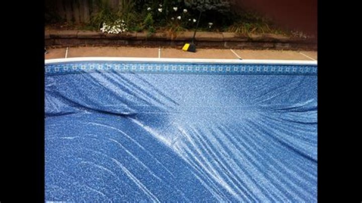 Why does water get behind pool liner?