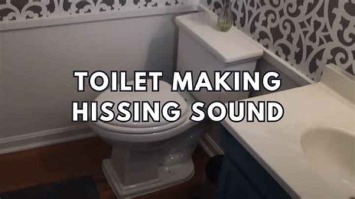 Why is the toilet making a hissing noise?