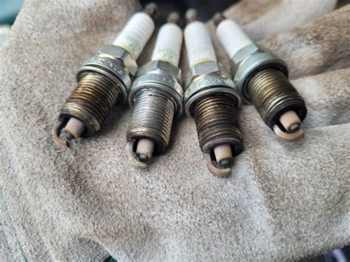 Why is there antifreeze in my spark plugs?